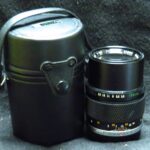 Olympus 135mm f4 Auto Telephoto Lens with Case.