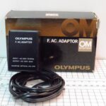 Olympus F, AC. Adapter